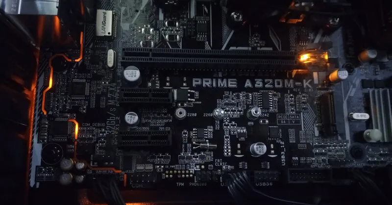 Detailed view of an electronic circuit board with integrated components and LED lights.
