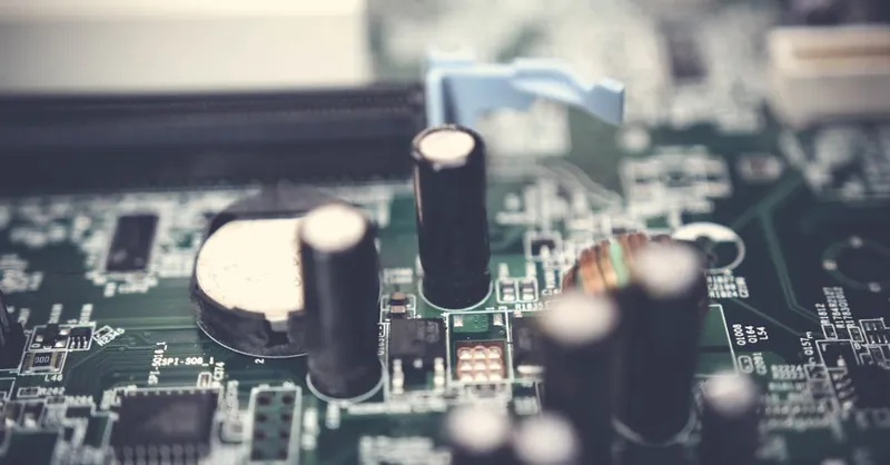 Detailed view of electronic components on a circuit board showcasing various parts.