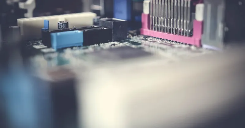 Detailed close-up of a circuit board showcasing electronic components in soft focus.