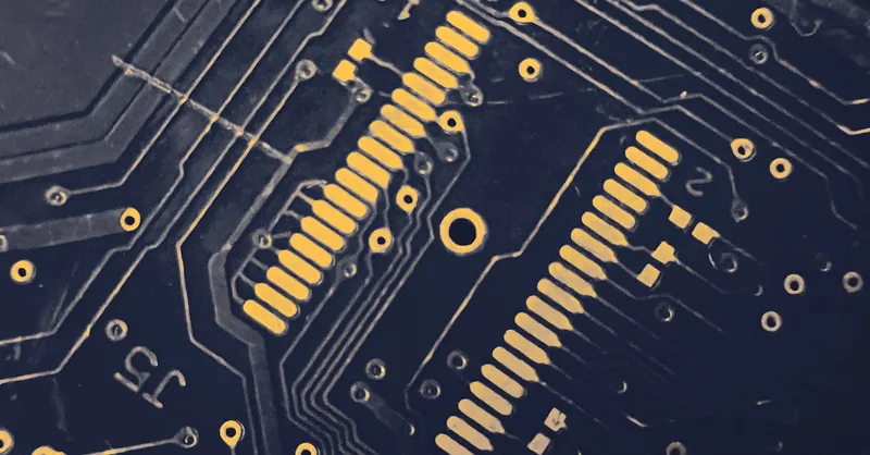 Detailed view of a modern electronic circuit board showing intricate pathways and components.